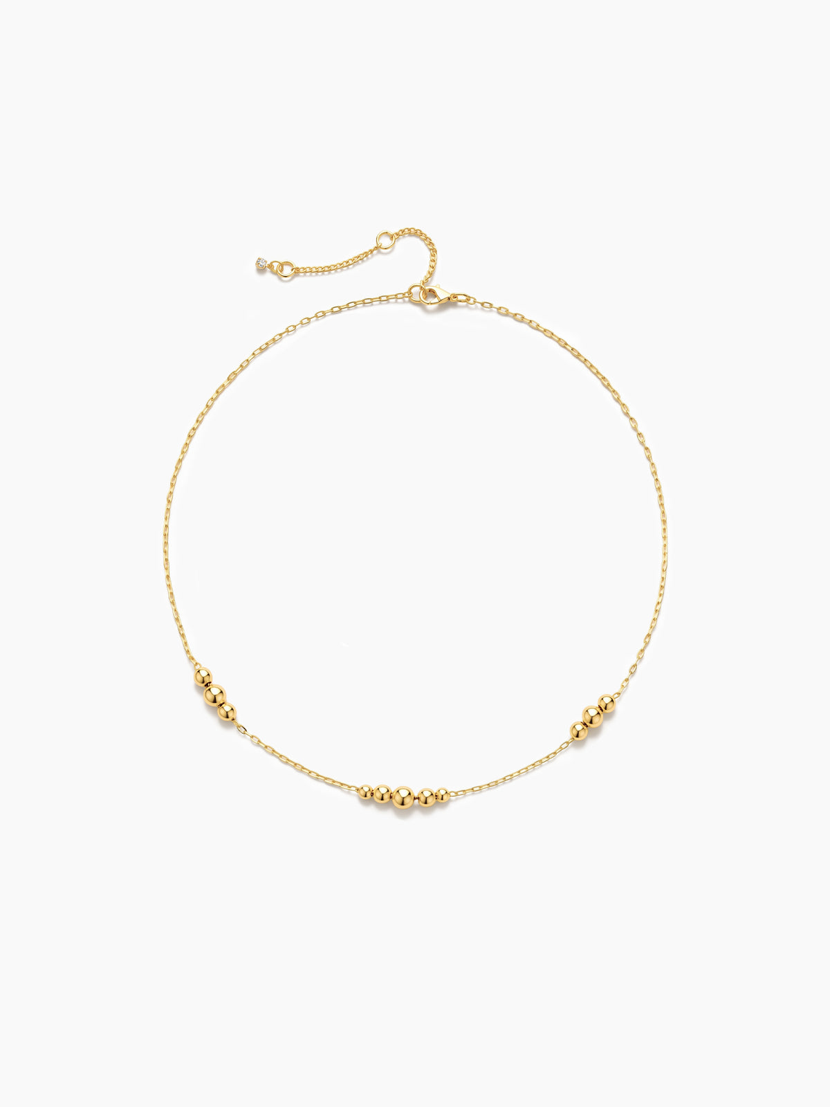 Gold necklace on a white background