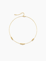 Gold necklace on a white background