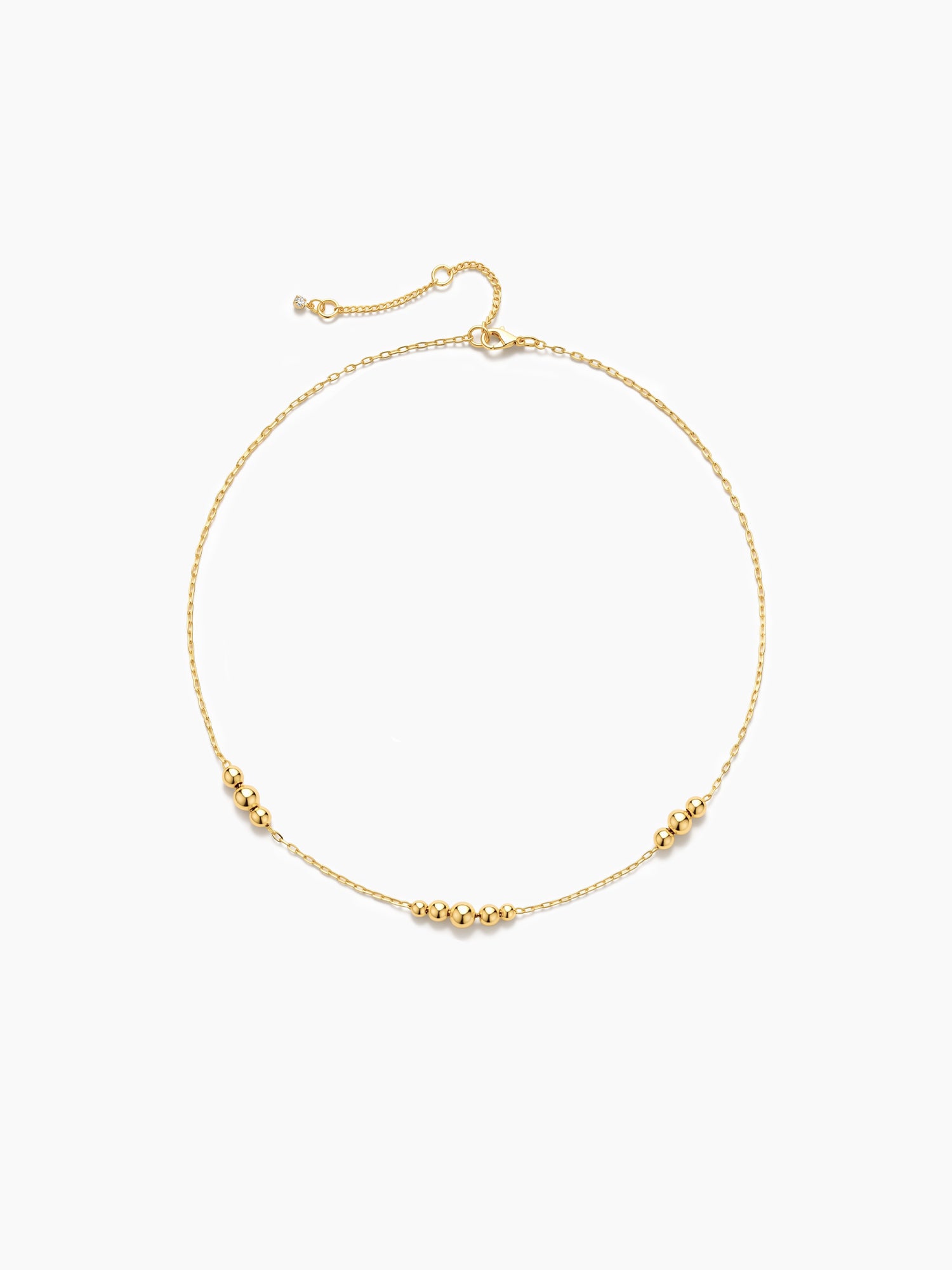 Gold necklace on a white background