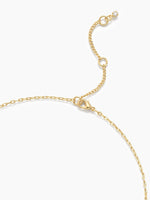 Gold necklace on a white background