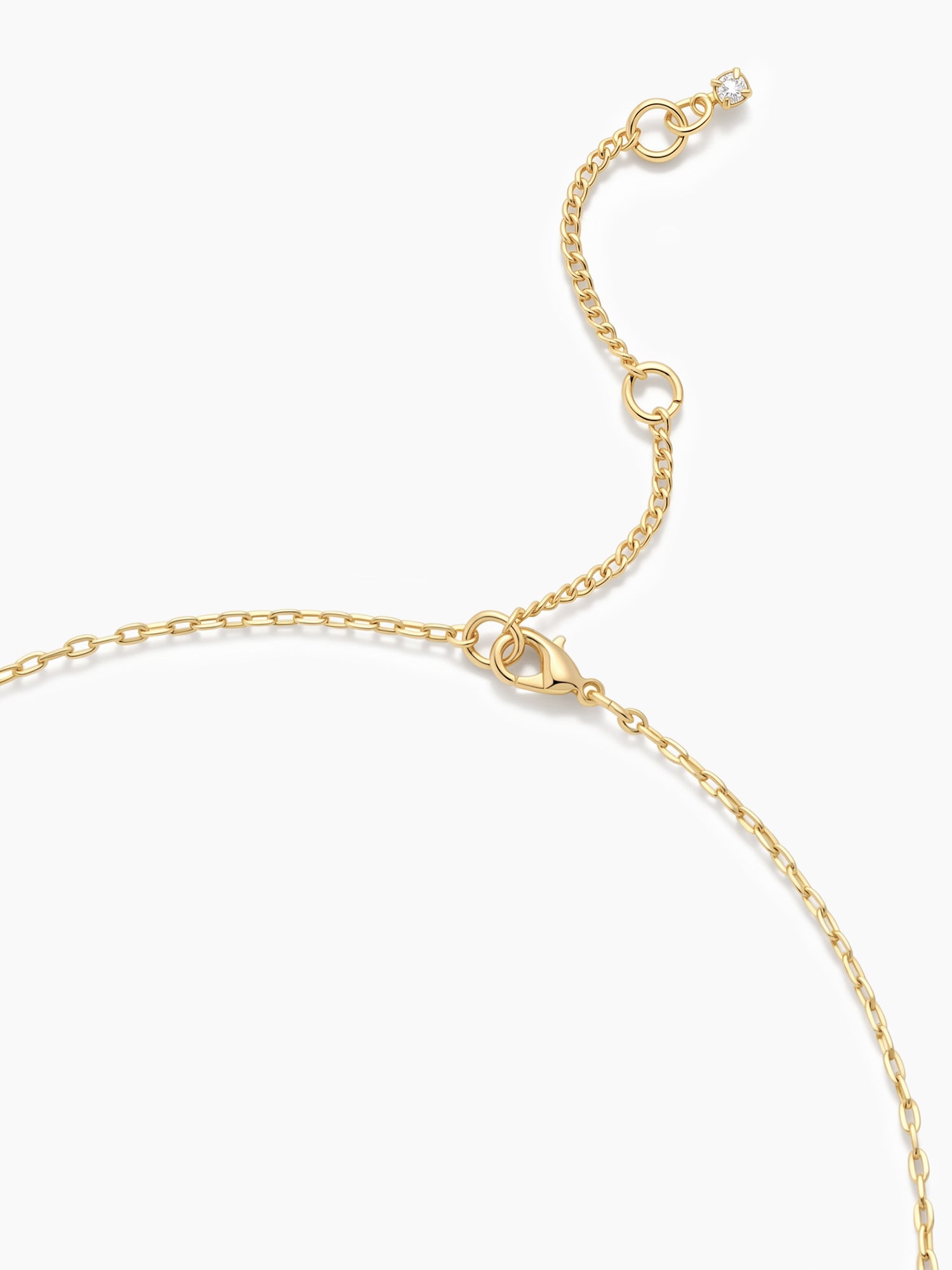 Gold necklace on a white background