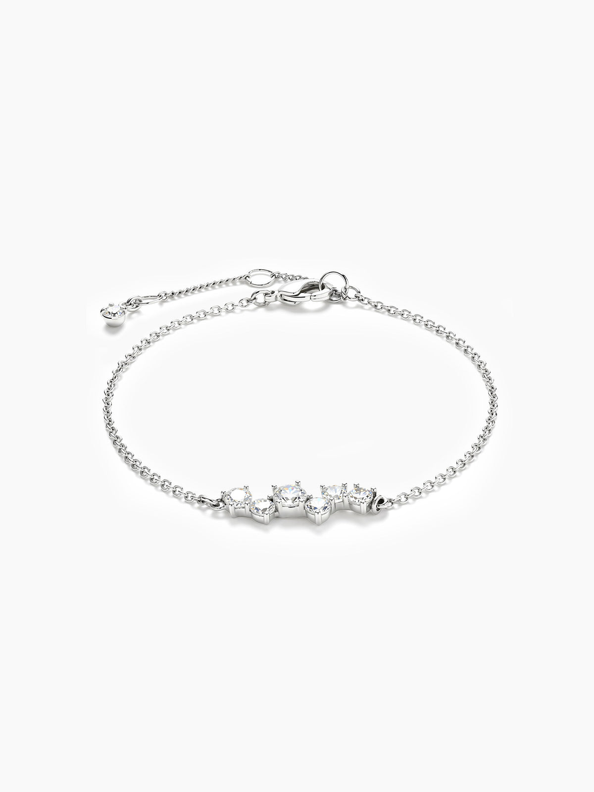A silver chain bracelet featuring a central cluster of round and marquise-cut cubic zirconia stones, with an adjustable sliding bead and lobster clasp, displayed on a plain white background.