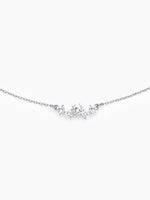 A close-up front view of the silver necklace pendant, highlighting the sparkling flower-like cluster of clear cubic zirconia stones.