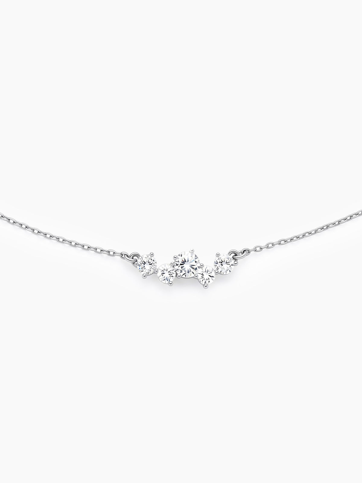 A close-up front view of the silver necklace pendant, highlighting the sparkling flower-like cluster of clear cubic zirconia stones.