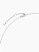 A close-up of the delicate silver chain showing the lobster clasp and the adjustable sliding bead for length adjustments.