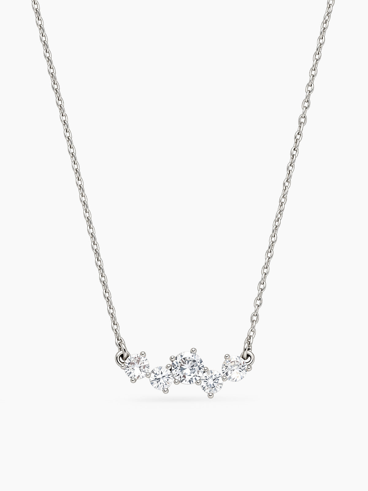 Silver CZ cluster necklace on a thin cable chain featuring prong-set round crystals. Elegant minimalist jewelry for women.