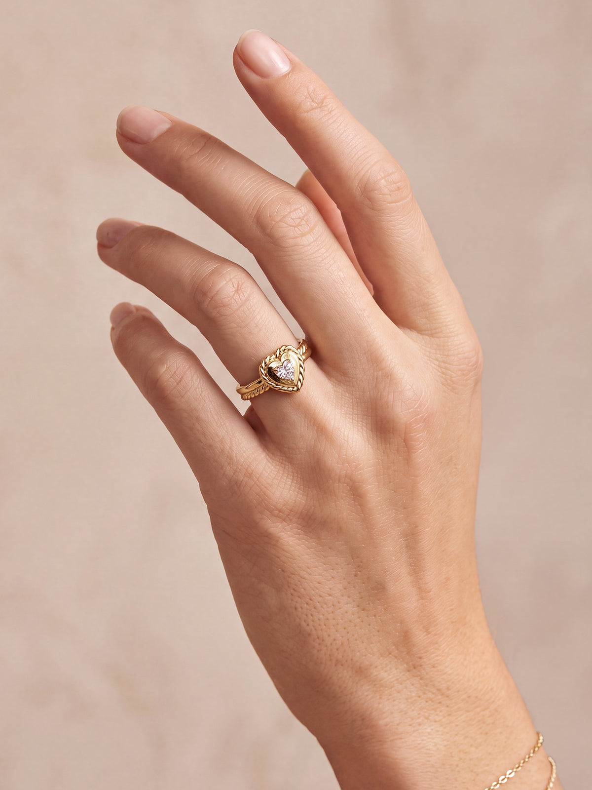 Twisted CZ Heart Ring in Gold